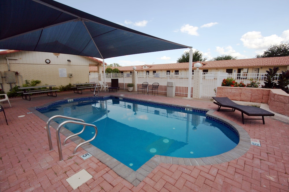 Outdoor pool at Executive Inn Edinburg