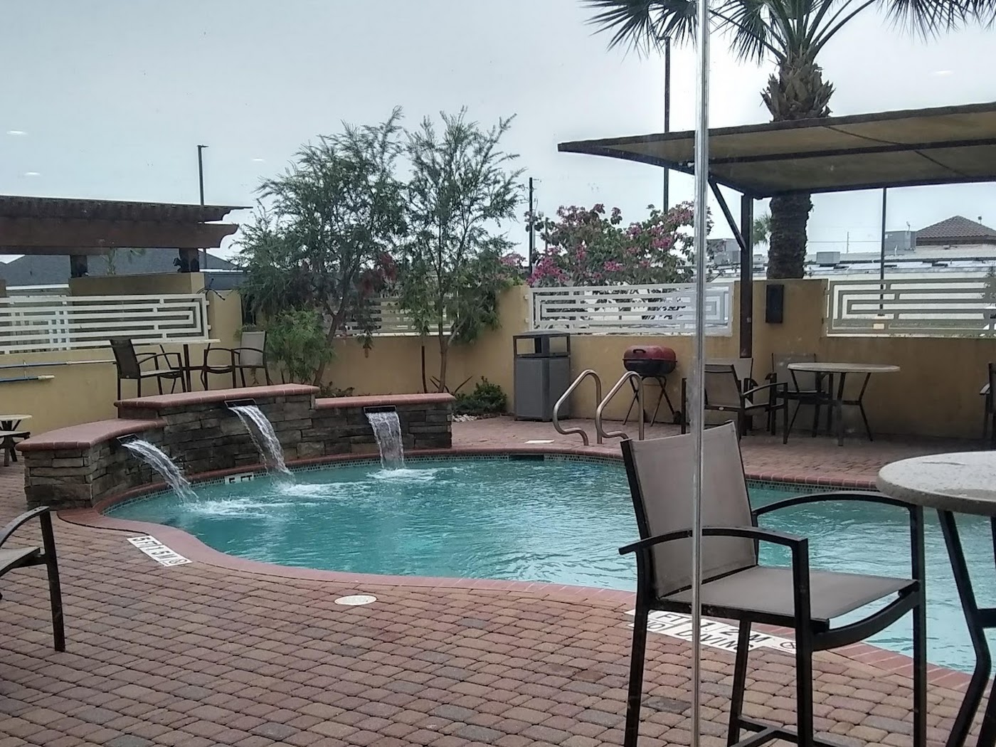 Outdoor pool at MainStay Suites Edinburg South