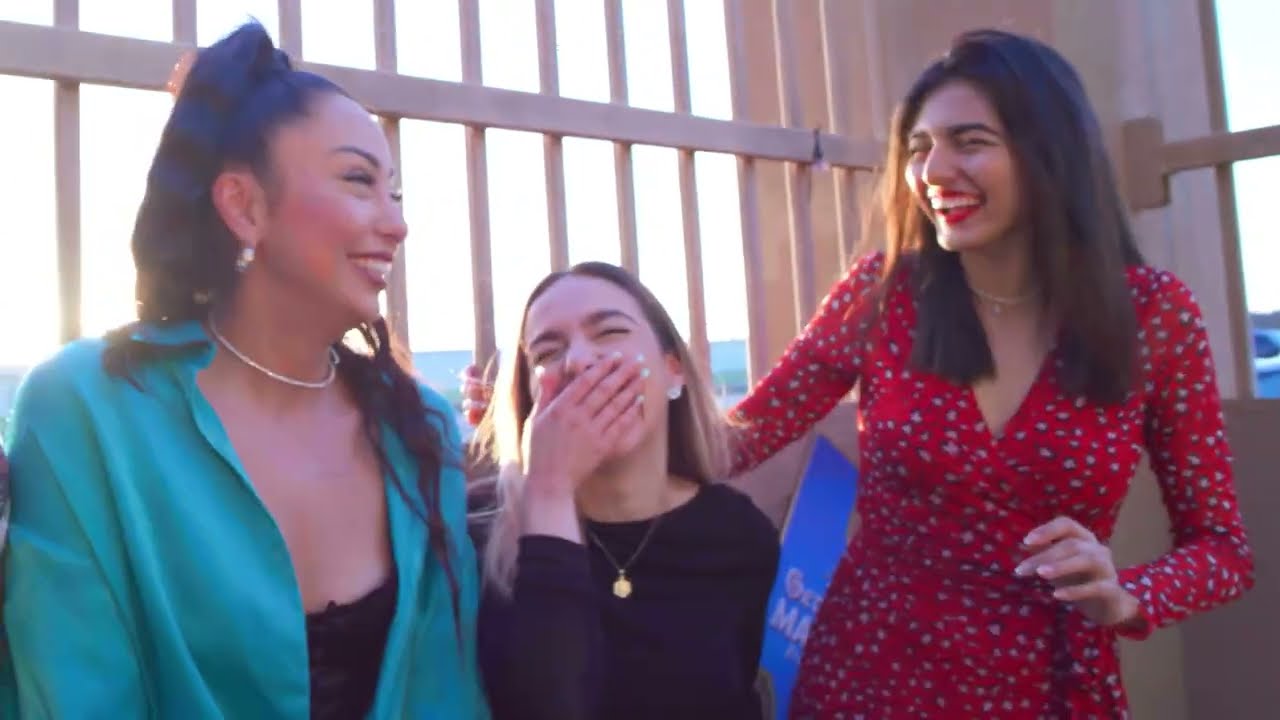 Friends laughing together during an evening in Edinburg